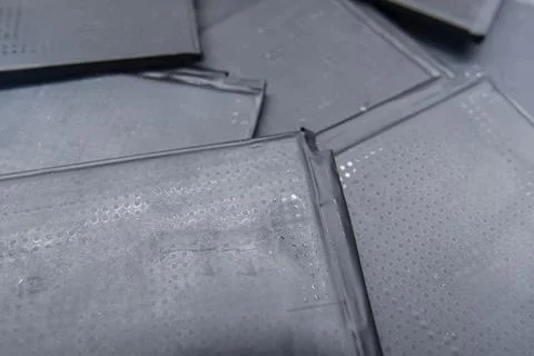 A stack of mobile phone batteries in the workshop Stock Photos