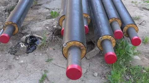 Stack modern plastic central heating pipes on house yard Vídeo Stock 53349322