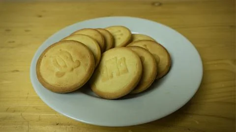 A stack of monde cakes on a white plate Stock Photos