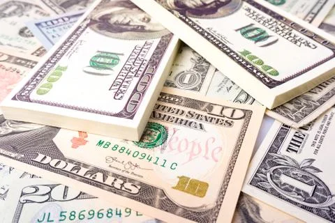 A stack of money. Background of money. dollars pile as background. Stock Photos