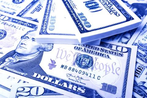 A stack of money. Background of money. dollars pile as background. Stock Photos