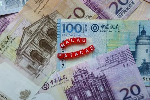 Stack of Money Marked With a Red Cubes Stock Photos