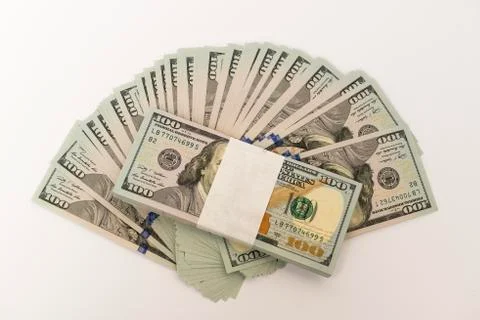 Stack of money in US dollars cash banknotes Stock Photos