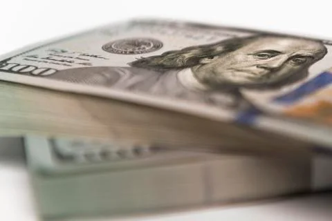 Stack of money in US dollars cash banknotes Stock Photos