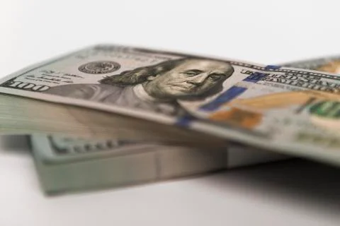 Stack of money in US dollars cash banknotes Stock Photos