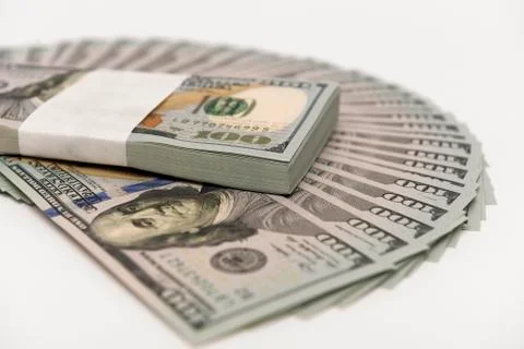 Stack of money in US dollars cash banknotes Stock Photos