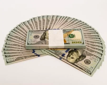 Stack of money in US dollars cash banknotes Stock Photos