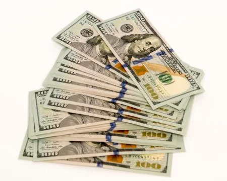 Stack of money in US dollars cash banknotes Stock Photos
