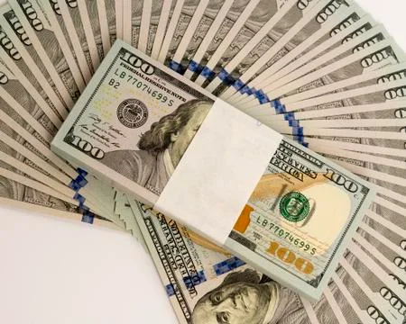 Stack of money in US dollars cash banknotes Stock Photos