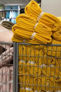 A stack of multi-colored bath towels close-up. Spa accessories for health car Stock Photos
