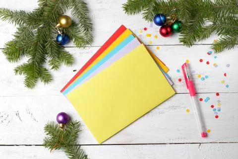 A stack of multi-colored envelopes with congratulations on Christmas or the N 스톡 사진