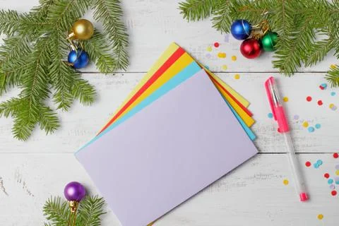 A stack of multi-colored envelopes with congratulations on Christmas or the N 写真素材