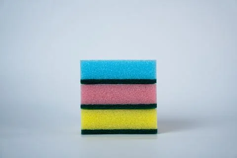 Stack of Multicolor Cleaning Sponges. Household and Hygiene Concept Stock Photos