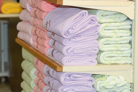Stack of multicolored bath towels Stock Photos