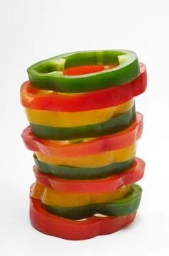 Stack Of Multicolored Capsicum Slices Stock Photos