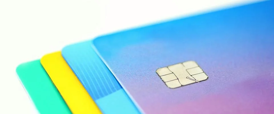 Stack of multicolored credit cards 写真素材