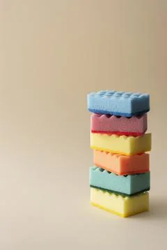 Stack of multicolored dishwashing sponges Stock Photos