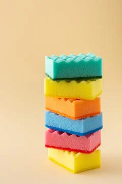 Stack of multicolored dishwashing sponges Stock Photos