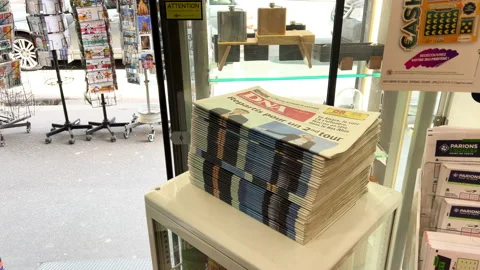 Stack with multiple DNA French newspaper Emmanuel Macron, Marine Le Pen Stock Footage 186193030