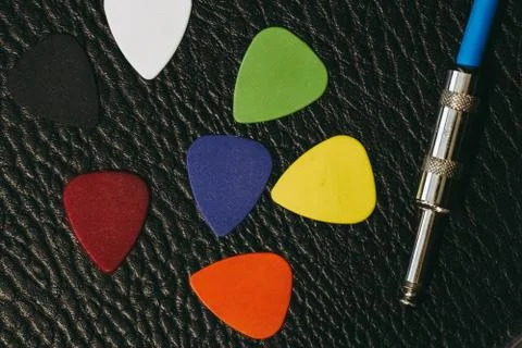 Stack of multiple multi colored guitar pick 库存照片