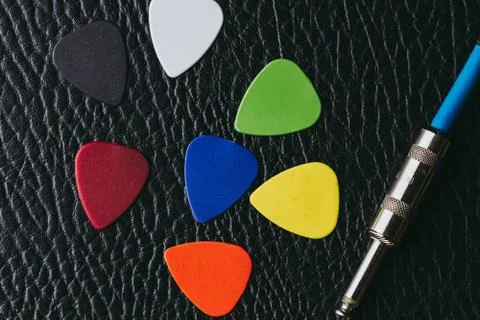 Stack of multiple multi colored guitar pick Stock Photos