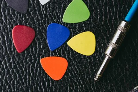 Stack of multiple multi colored guitar pick Stock-Fotos