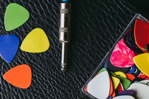 Stack of multiple multi colored guitar pick Stock Photos