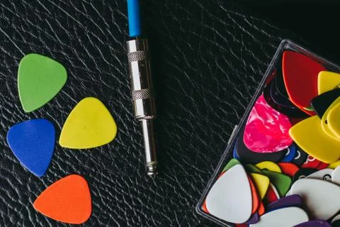 Stack of multiple multi colored guitar pick Foto stock