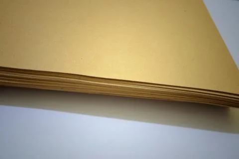 Stack of Neutral Toned Paper Sheets Perfect for Crafting or Creative Projects Stock Photos