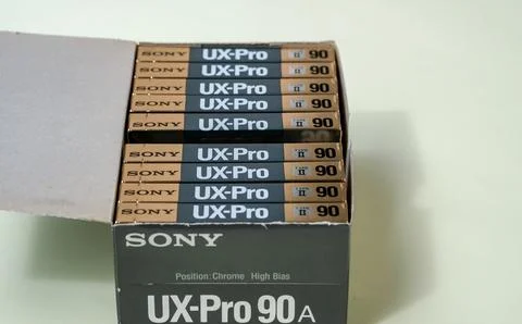 Stack of new black gold audio cassettes Sony UIX Pro 90 into original box. Stock Photos