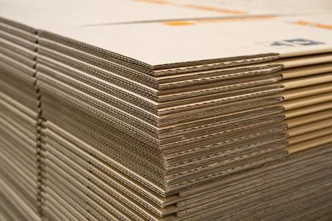 Stack of new Disassembled condition packaging corrugated carboard boxes. lo.. Stock Photos