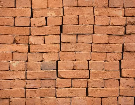 Stack of new red bricks background Stockfoto's
