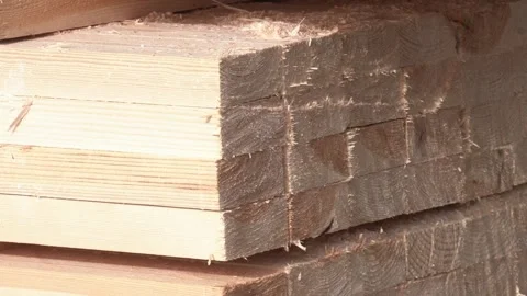 Stack of new wooden planks. Stack of wooden planks close up, soft focus Vídeos de archivo 237213744