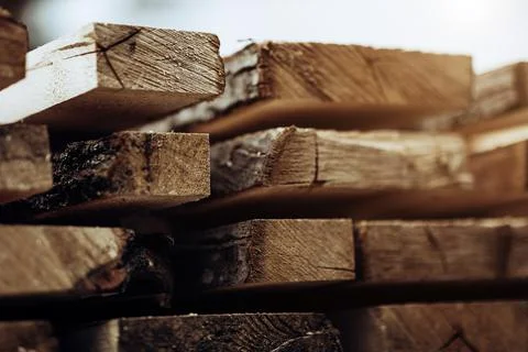 Stack Of New Wooden Studs At The Lumber Yard. Wood Timber Construction Material. Stock Photos