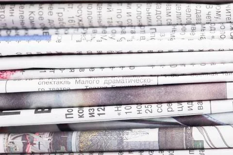 Stack of newspapers closeup background Stock Photos