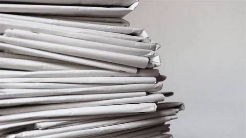 Stack of newspapers Stock Footage 75337571