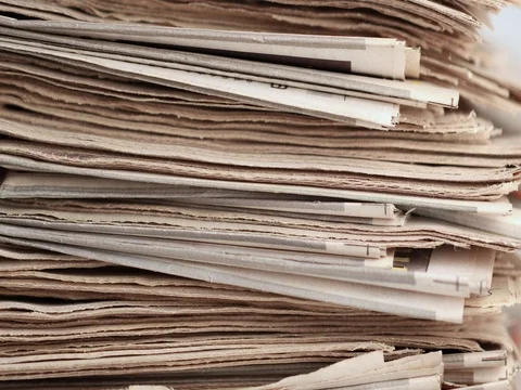 Stack of newspapers Stock Footage 78057127