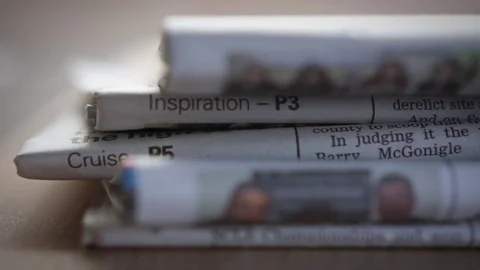 Stack Of Newspapers HD Stock Footage. Stock Footage 83385220