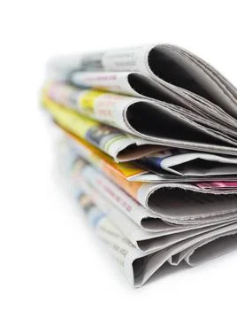 Stack of newspapers Stack of newspapers isolated on white background (Lice... 库存照片