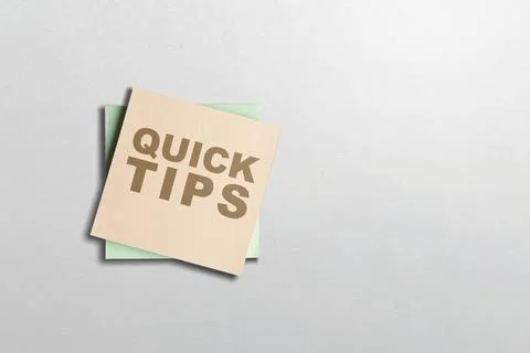 Stack of note paper with 'Quick tips' text Stock Photos