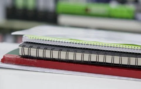 Stack of notebook on desk Stock Photos
