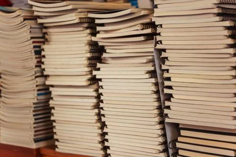 Stack of notebooks and books close -up Stock Photos