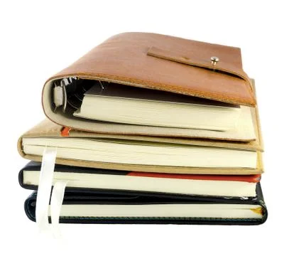 Stack of notebooks isolated on white Stock Photos
