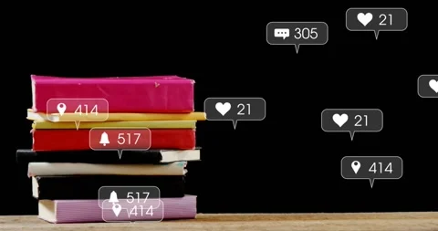 Stack of notebooks sitting on wooden table, social media buzz sparking icon Stock Footage 334182397