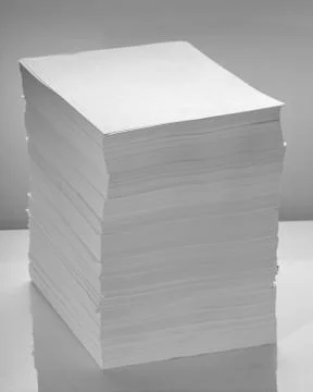 Stack of office paper, on a white background. Concept, minimalism Stock Photos