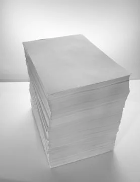 Stack of office paper, on a white background. Concept, minimalism 写真素材