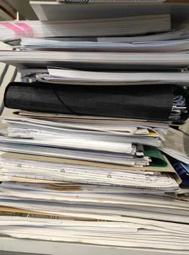 A stack of office papers and magazines. waste paper Stock Photos