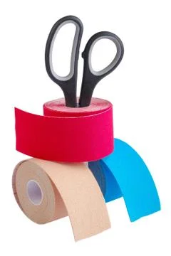 Stack ofthree rolls kinesiology tape for athletes and scissors isolated on white Stock Photos