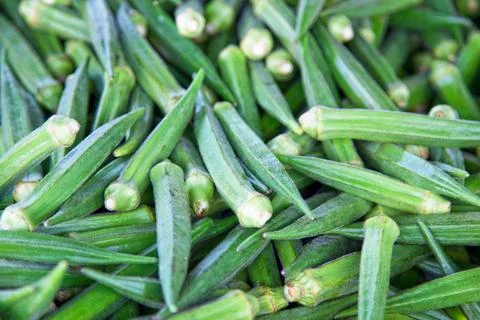 Stack of okras on a market stall Stock Photos