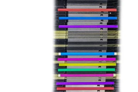 Stack of old 1.44 inch floppy disks used to save computer data from the 90s Foto stock